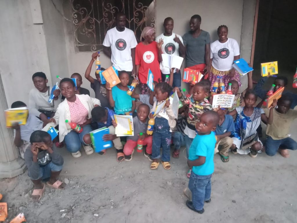 Distribution of books, text books to orphans and disadvantaged children at Ébomkop - In Cameroon